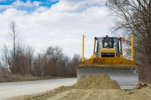 bulldozed in road